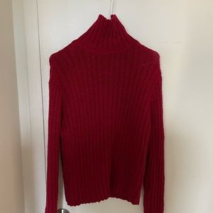Warm knitted turtleneck sweater